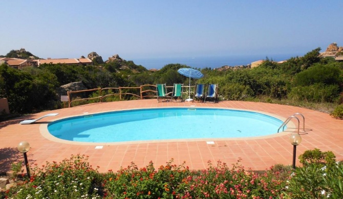2 bedrooms house with sea view shared pool and furnished garden at Costa Paradiso 2 km away from the beach